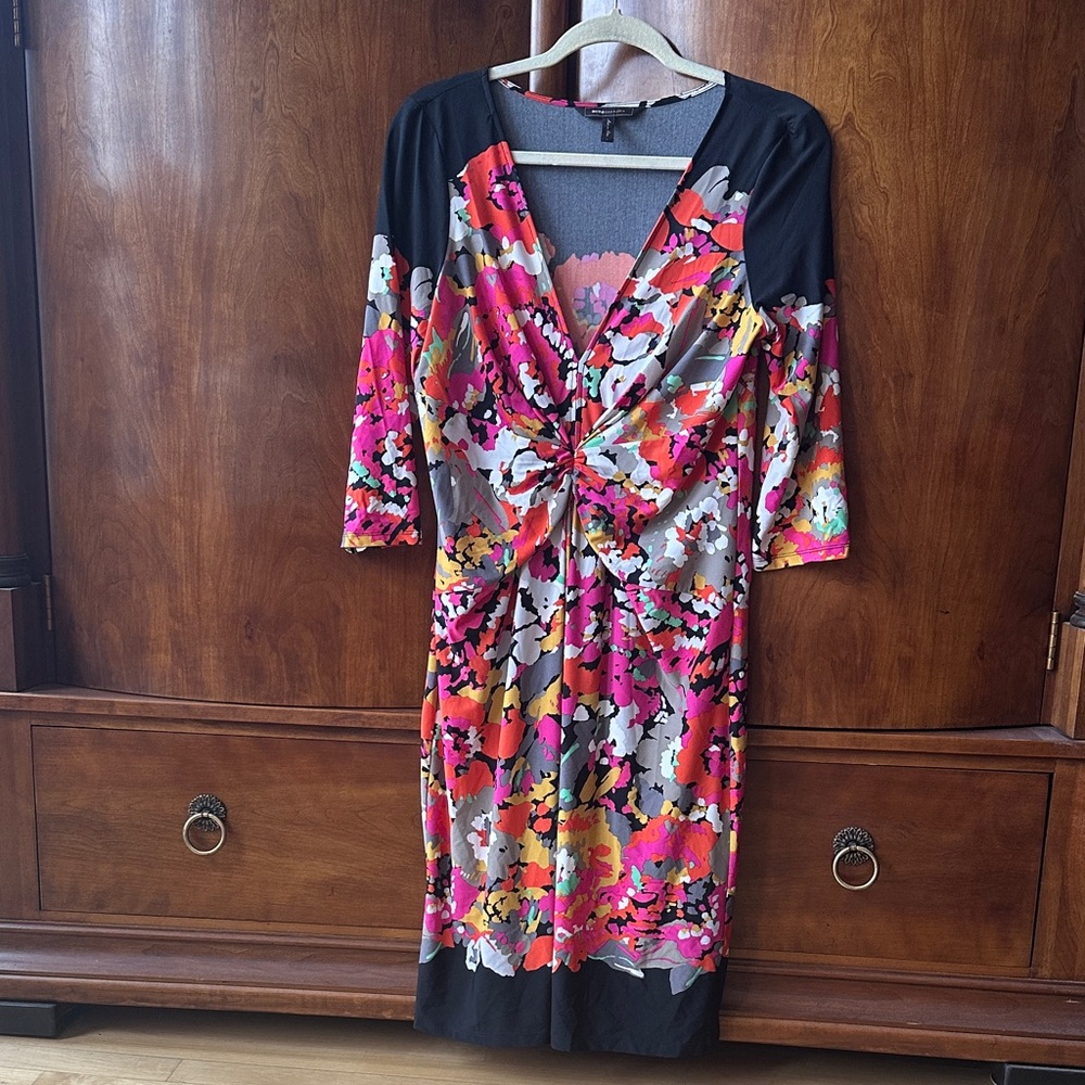 BCBGMaxAzria floral-printed dress in a faux-wrap silhouette.